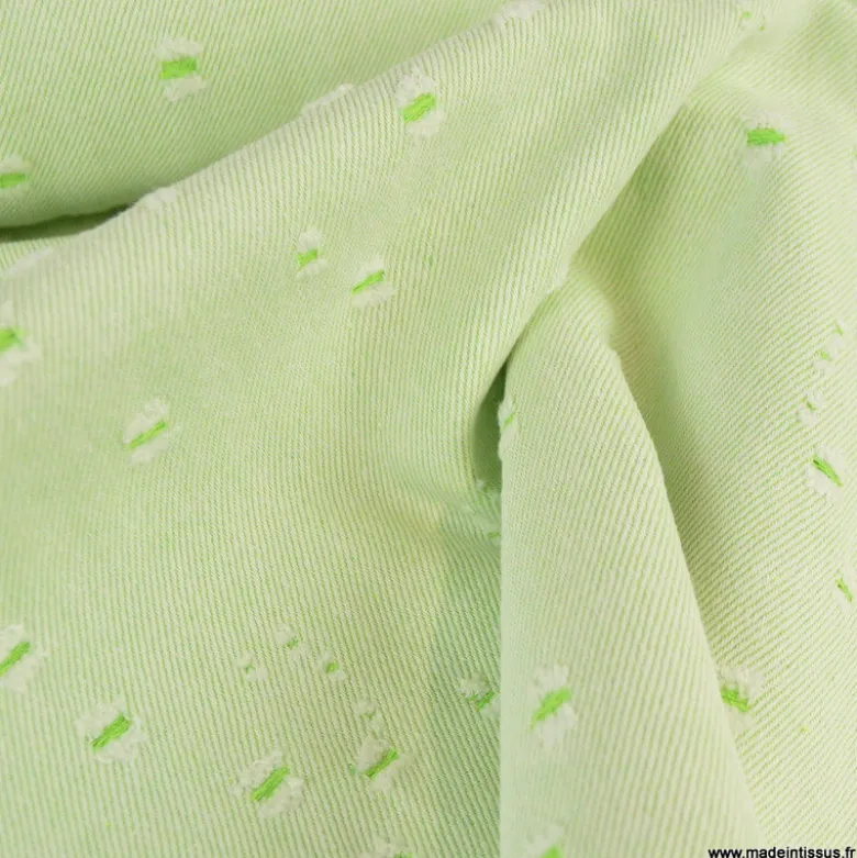 Tissu jean vert anis Fantaisie troué