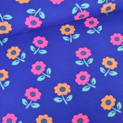 Tissu jersey coton Poppy motif fleurs rose fluo - fond Cobalt