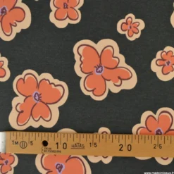 Tissu jersey coton Poppy motif fleurs orange sur fond noir