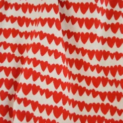 Tissu jersey côtelé bio motif coeurs rouges fond naturel - Poppy fabrics