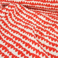 Tissu jersey côtelé bio motif coeurs rouges fond naturel - Poppy fabrics