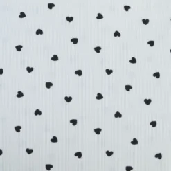 Tissu jersey côtelé motif coeurs Noirs fond blanc