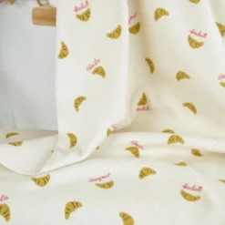 Tissu jersey côtelé motif croissants fond naturel - Poppy fabrics