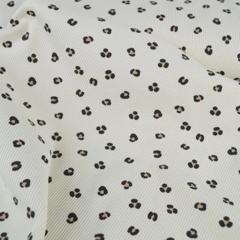 Tissu jersey côtelé motif léopard fond sable