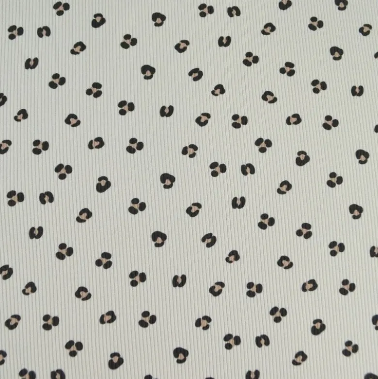Tissu jersey côtelé motif léopard fond sable