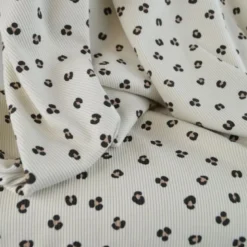 Tissu jersey côtelé motif léopard fond sable