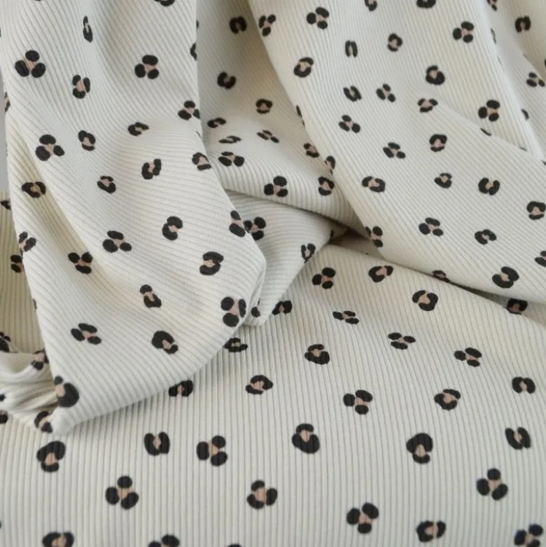 Tissu jersey côtelé motif léopard fond sable