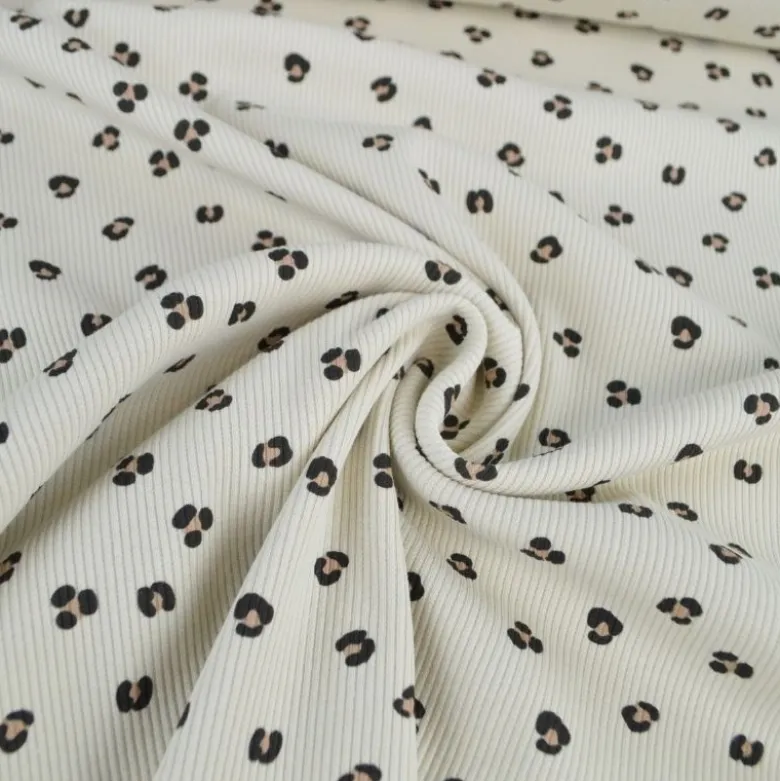 Tissu jersey côtelé motif léopard fond sable