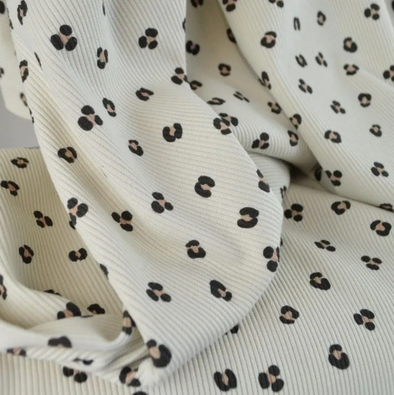 Tissu jersey côtelé motif léopard fond sable