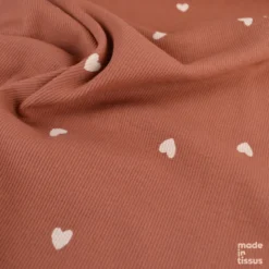 Tissu jersey côtelé motif petits coeurs fond vieux rose - OEKO TEX