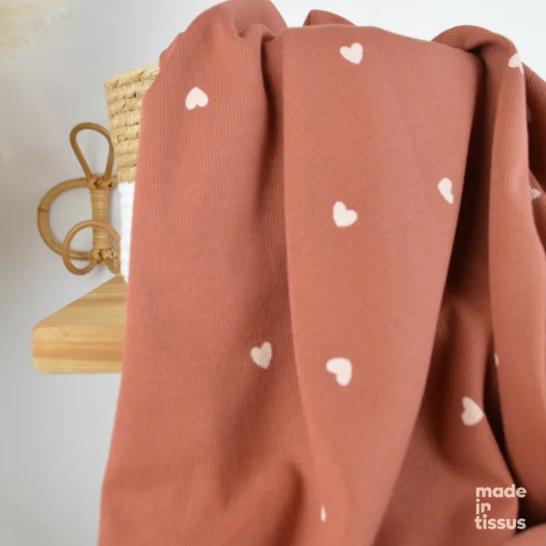 Tissu jersey côtelé motif petits coeurs fond vieux rose - OEKO TEX