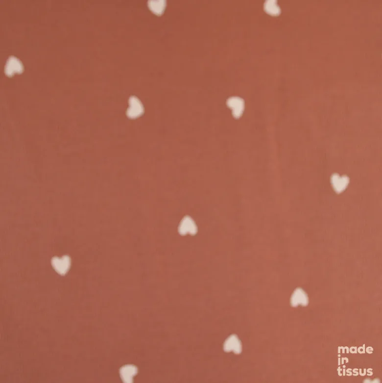 Tissu jersey côtelé motif petits coeurs fond vieux rose - OEKO TEX