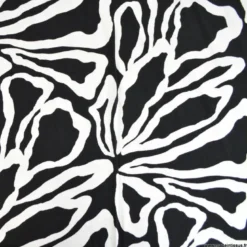 Tissu Jersey de Viscose Mael motifs pétale noir