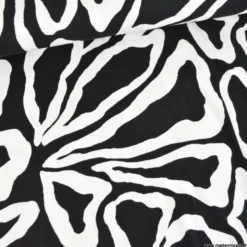 Tissu Jersey de Viscose Mael motifs pétale noir