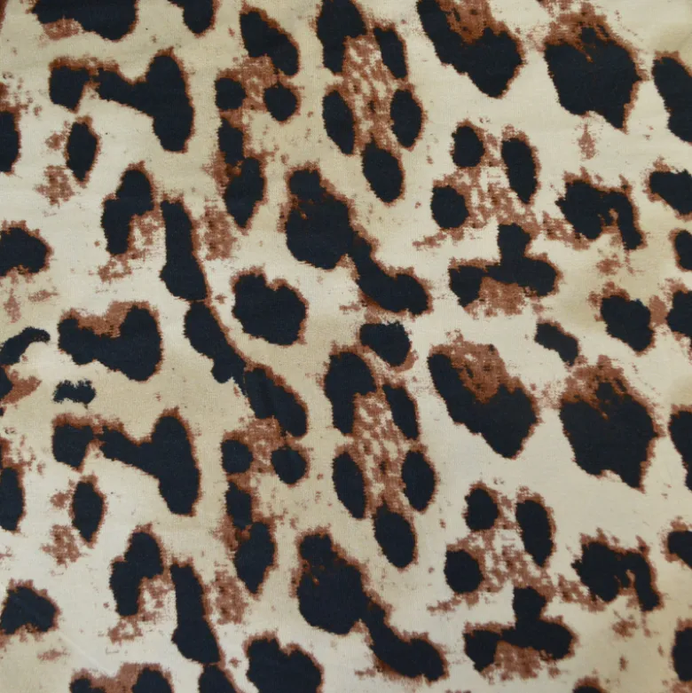 Tissu Jersey de Viscose – Motif léopard fond beige - OEKO TEX