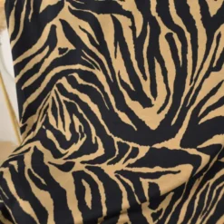 Tissu Jersey de Viscose motifs zebré Noir et Camel - OEKO TEX