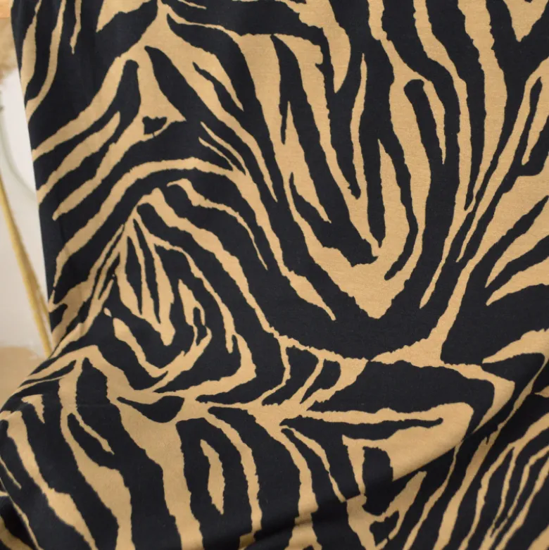 Tissu Jersey de Viscose motifs zebré Noir et Camel - OEKO TEX