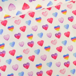 Tissu jersey à motif coeurs roses et bleus - OEKO TEX