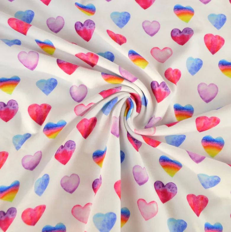 Tissu jersey à motif coeurs roses et bleus - OEKO TEX