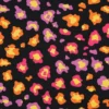 Tissu Jersey motif Léopard Pailleté – Multicolore sur Fond Noir - Poppy