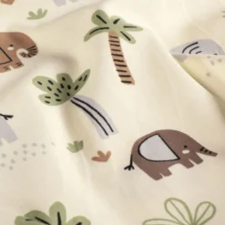 Tissu jersey motif éléphants et palmiers fond beige - OEKO TEX