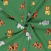 Tissu Jersey motif éléphants, tigres et lions fond vert - OEKO TEX