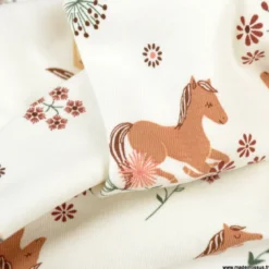 Tissu jersey motifs chevaux et fleurs fond blanc cassé - OEKO TEX