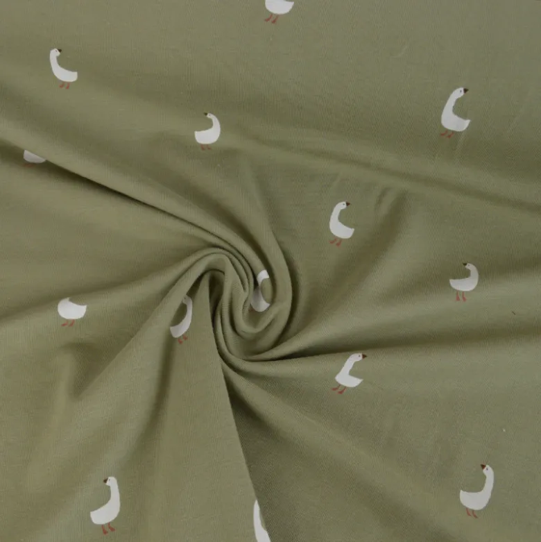 Tissu jersey motifs oies sur fond vert kaki - OEKO TEX