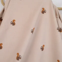 Tissu jersey motifs petits écureuils sur fond beige - OEKO TEX