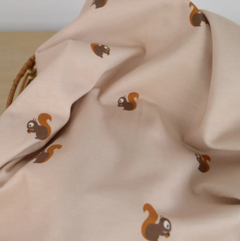 Tissu jersey motifs petits écureuils sur fond beige - OEKO TEX
