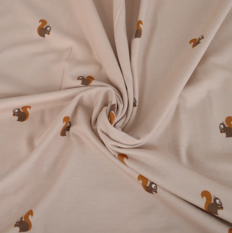 Tissu jersey motifs petits écureuils sur fond beige - OEKO TEX