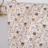 Tissu jersey petites maison et fleurs fond blanc cassé - OEKO TEX