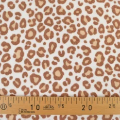 Tissu jersey éponge coton – Motif léopard fond blanc cassé - OEKO TEX