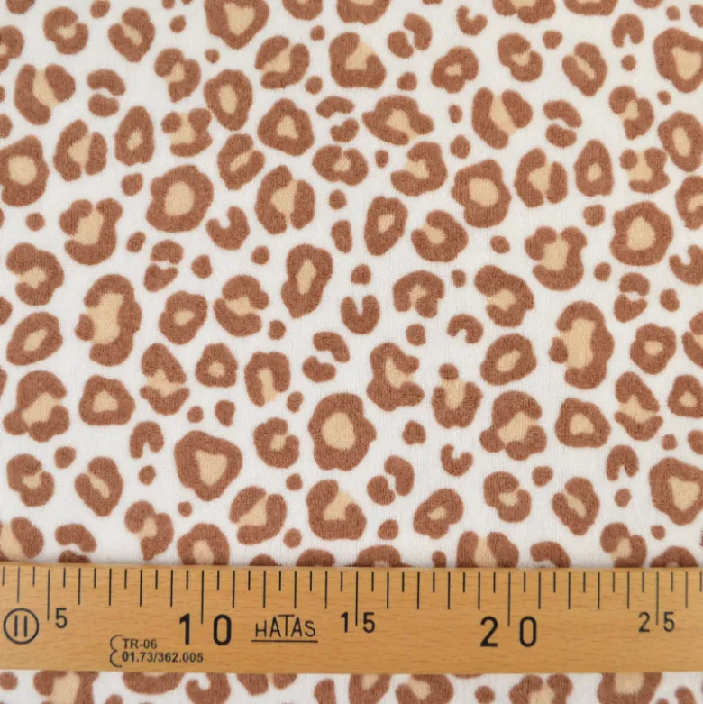 Tissu jersey éponge coton – Motif léopard fond blanc cassé - OEKO TEX