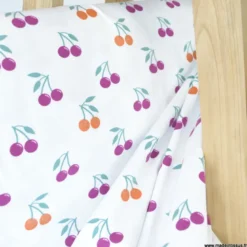Tissu jersey Poppy motif cerises à paillettes fond blanc - OEKO TEX