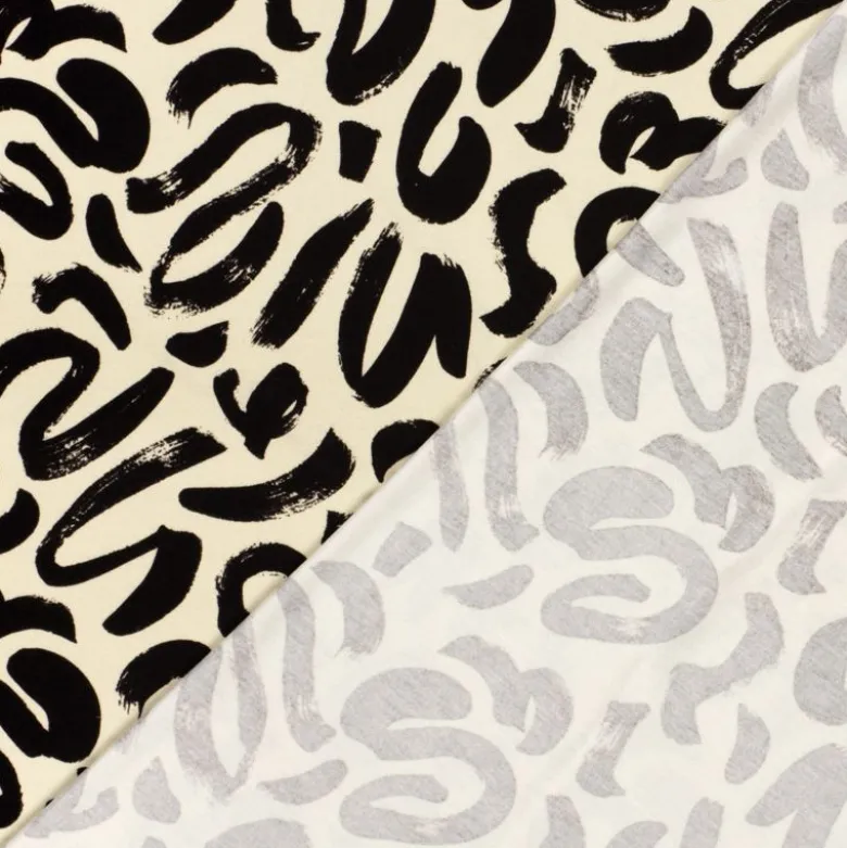 Tissu jersey viscose motif abstrait beige et noir