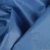 Tissu leger imperméable étanche polyester enduit acrylique bleu denim.