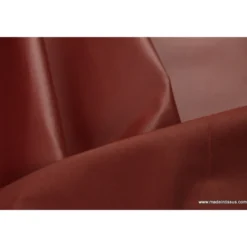 Tissu leger imperméable étanche polyester enduit acrylique bordeaux .