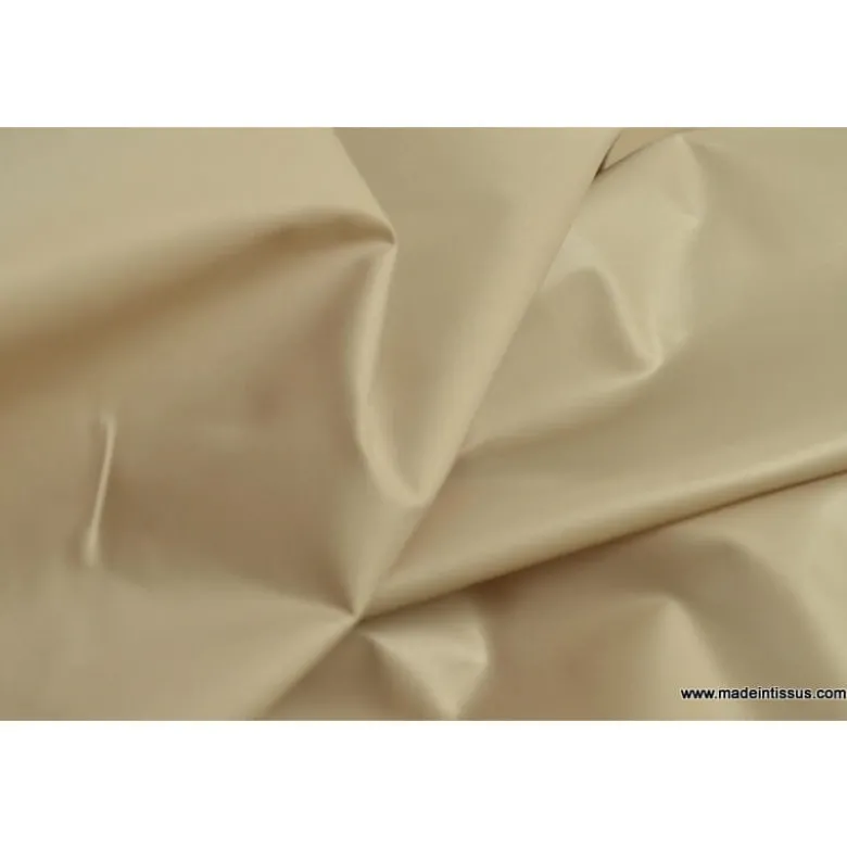 Tissu leger imperméable étanche polyester enduit acrylique beige .