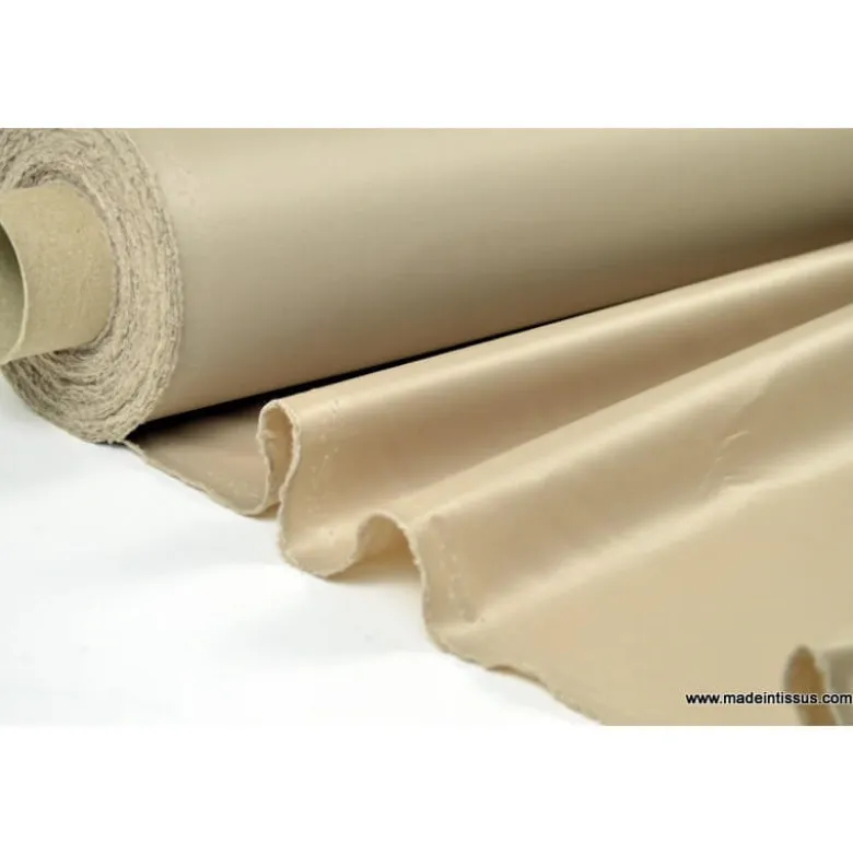 Tissu leger imperméable étanche polyester enduit acrylique beige .