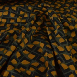 Tissu maille milano motif graphique ocre sur fond kaki - Oeko-Tex
