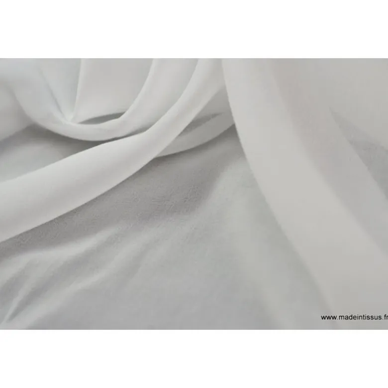 Tissu Mousseline coloris blanc .
