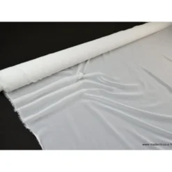 Tissu Mousseline coloris blanc .
