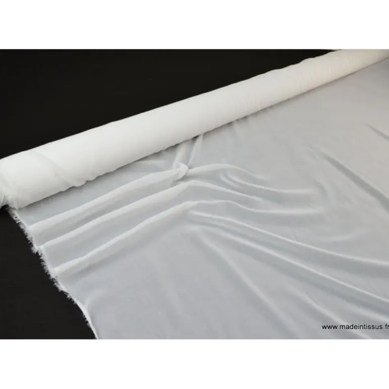 Tissu Mousseline coloris blanc .