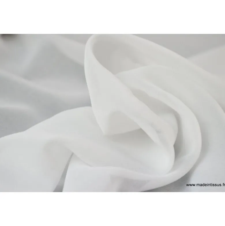 Tissu Mousseline coloris blanc .