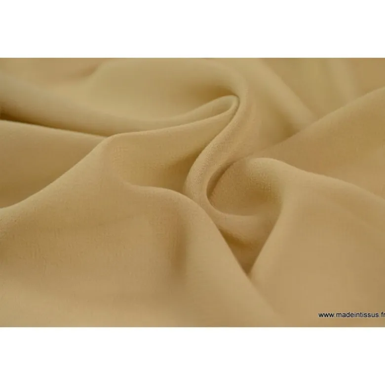 Tissu Mousseline coloris chair .
