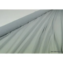 Tissu Mousseline fluide polyester gris .