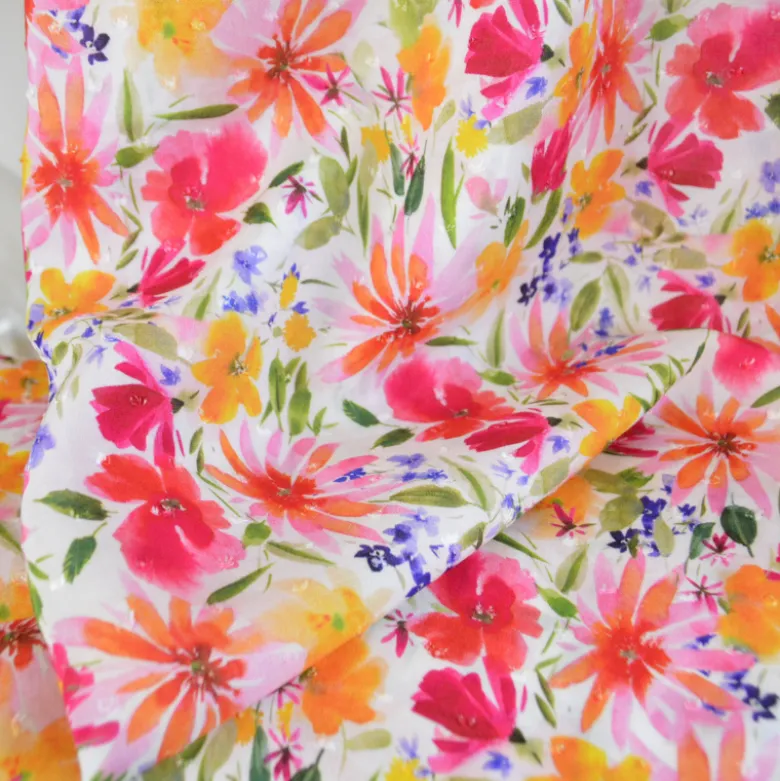 Tissu plumetis de viscose fleurs roses, jaunes et vertes – Fond blanc