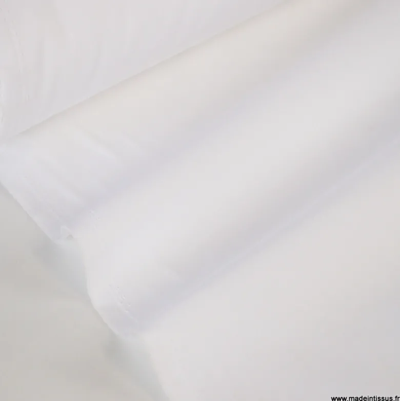 Tissu polyester coton uni blanc pour blouse légère.