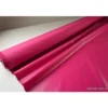 Tissu polyester fuchsia déperlant pour parapluie .